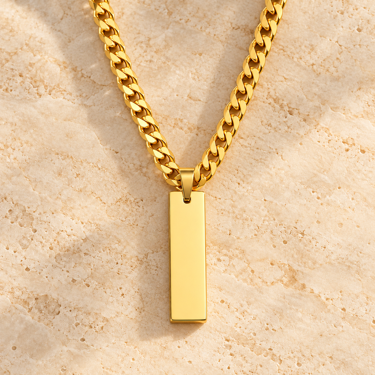 Collier Trait d’union maille cubaine doré